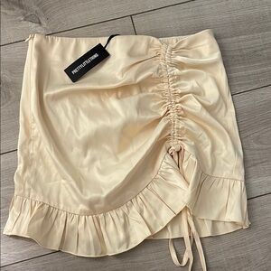 PrettyLittleThing Cream Bubble Mini Skirt